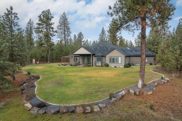 view of front of property with a front lawn