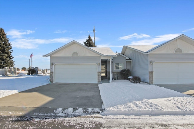 single story home with a garage