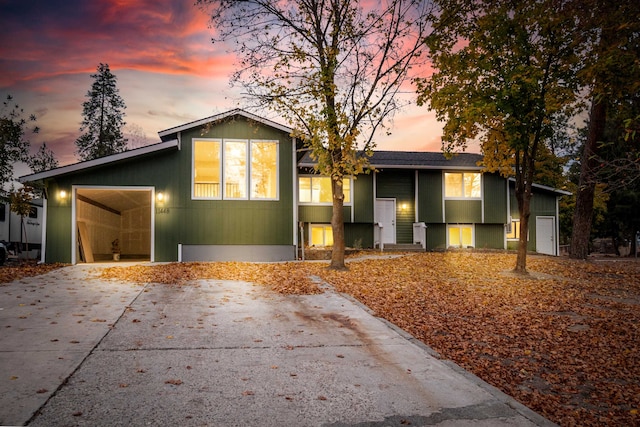 view of front of property with a garage