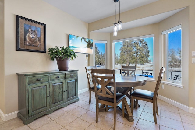 dining room with light tile patterned floors