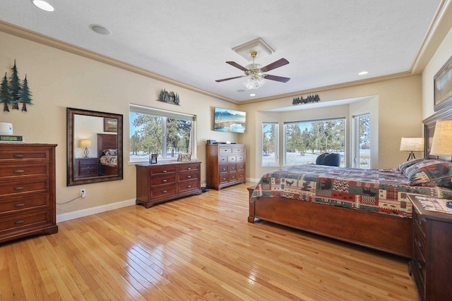 bedroom with ornamental molding, ceiling fan, access to exterior, and light hardwood / wood-style floors