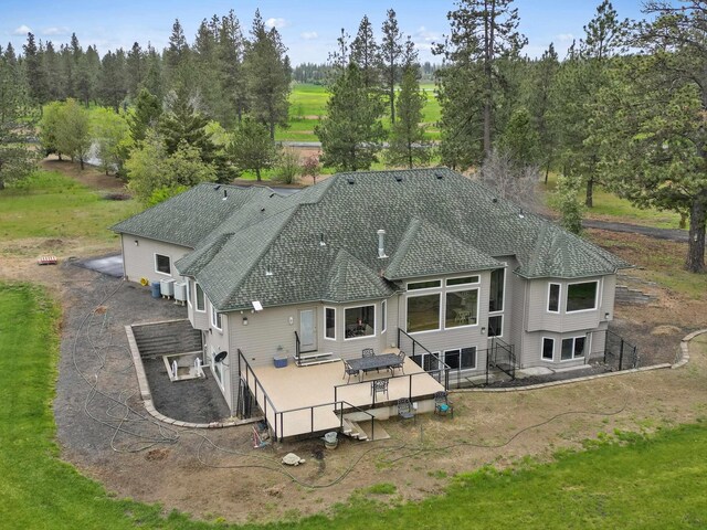6919 E Spangle-Waverly Rd, Spangle, WA 99031 - back of house with roof with shingles and entry steps