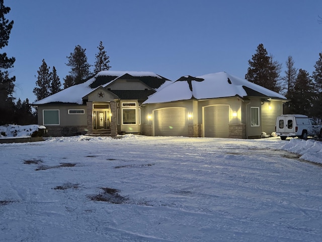 view of front of property featuring a garage