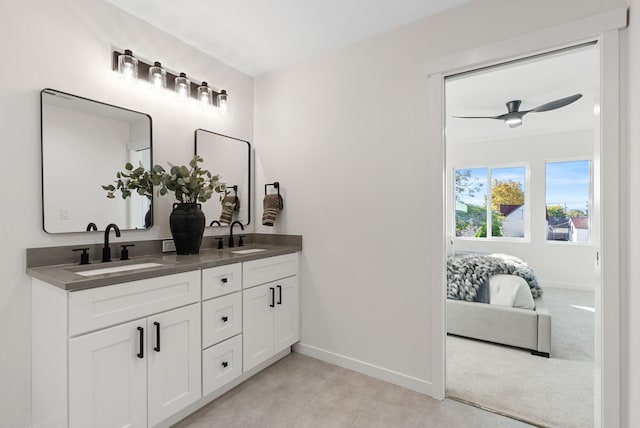 bathroom featuring vanity and ceiling fan