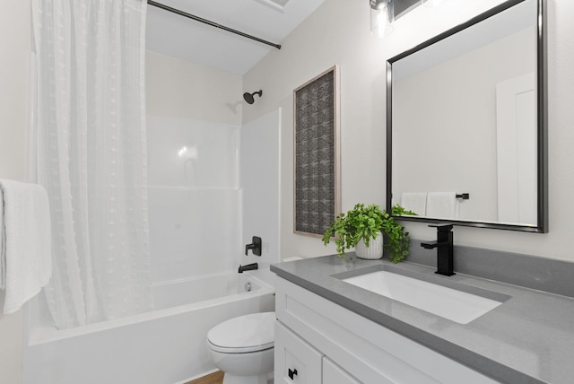 full bathroom featuring vanity, toilet, and shower / bath combo with shower curtain