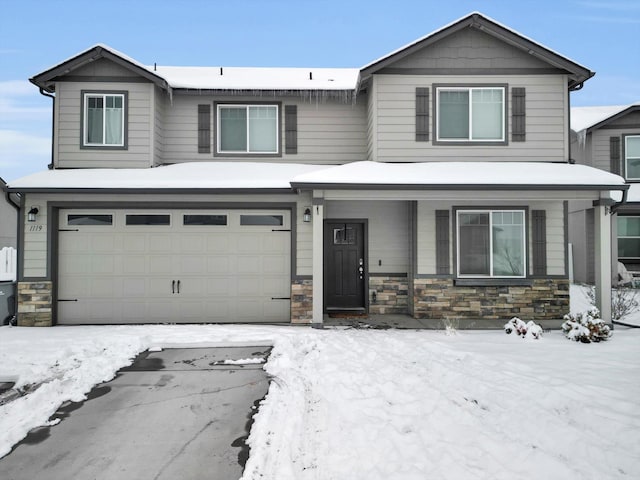 view of front of property with a garage