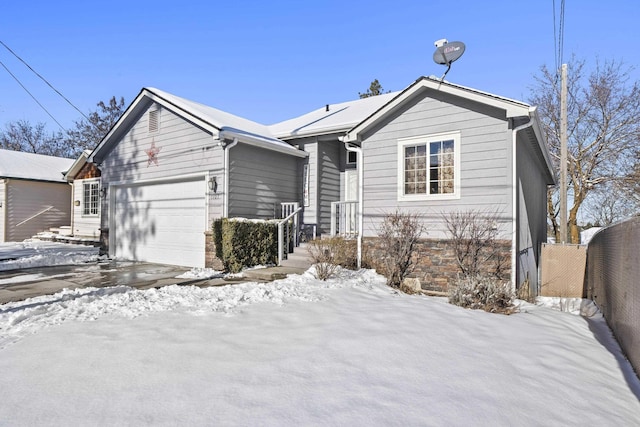 view of front of property with a garage