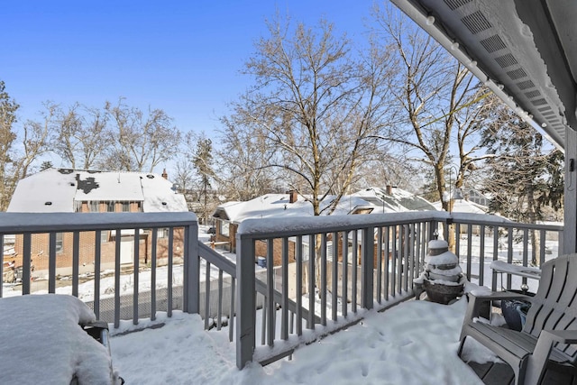 view of snow covered deck