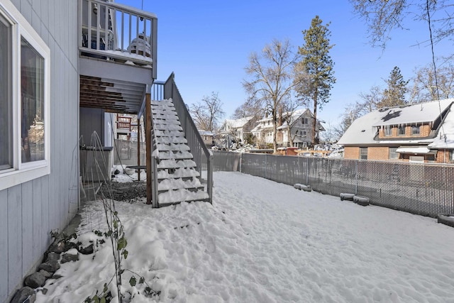 view of yard covered in snow