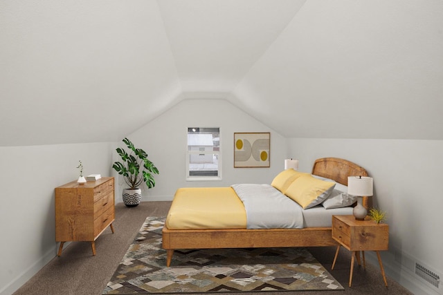 carpeted bedroom with lofted ceiling