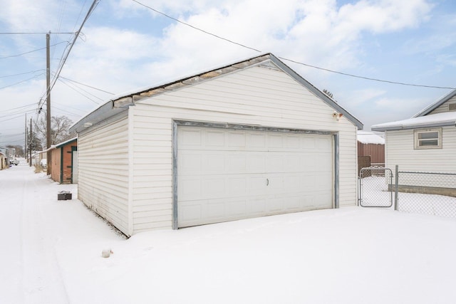 view of snow covered garage