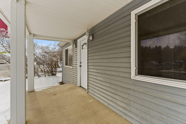 view of snow covered patio