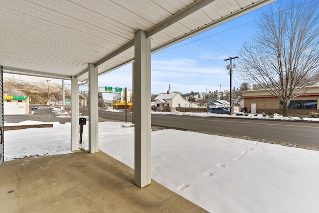 view of snow covered patio