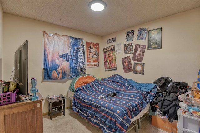 carpeted bedroom featuring a textured ceiling