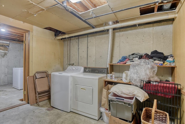 laundry room with washer and dryer