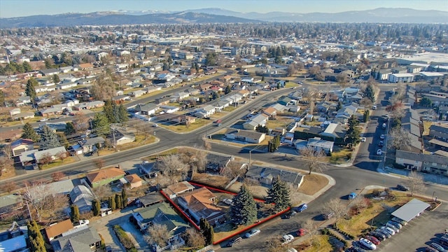 birds eye view of property with a mountain view