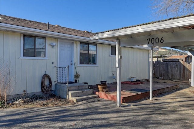 entrance to property with a deck