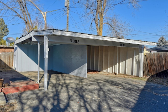 view of outdoor structure with a carport