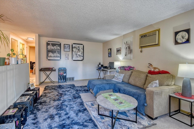 living room with a textured ceiling, carpet, and an AC wall unit