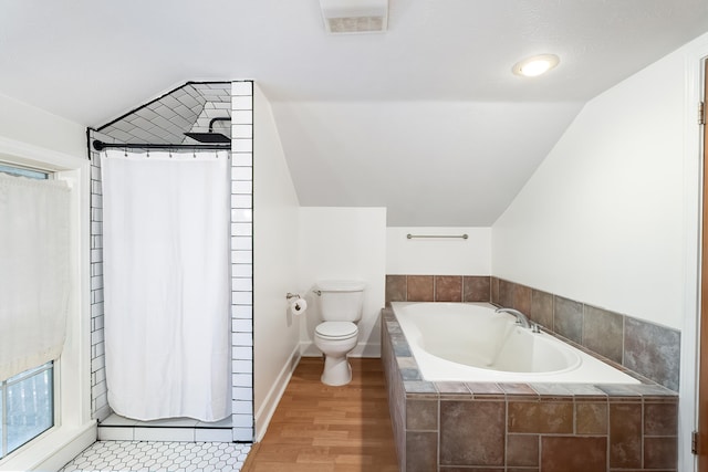 full bath with a shower with curtain, toilet, a bath, lofted ceiling, and wood finished floors