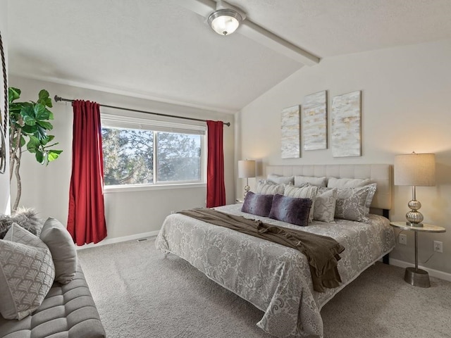 bedroom featuring vaulted ceiling with beams and carpet