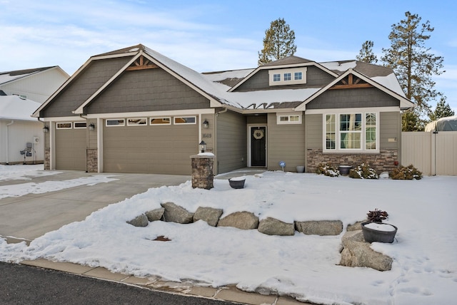 craftsman house with a garage