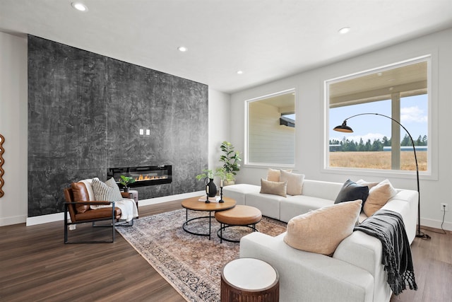 914 E Deer Park-Milan Rd, Deer Park, WA 99006 - living area featuring recessed lighting, dark wood-style flooring, baseboards, and a fireplace