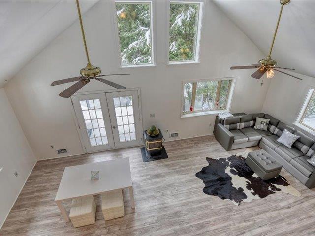 bedroom featuring vaulted ceiling and carpet floors