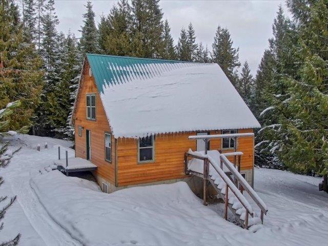 view of snow covered house