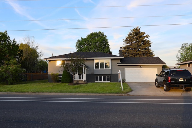 1723 S Evergreen Rd, Veradale, WA 99037 - bi-level home featuring an attached garage and driveway