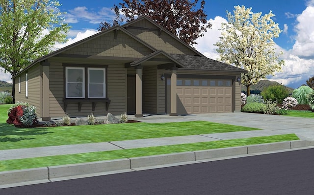 view of front of home with a garage and a front lawn