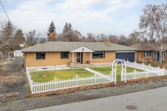 ranch-style home featuring a garage