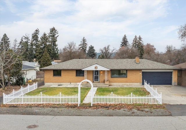 single story home featuring a garage