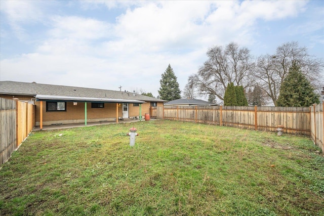 view of yard with a patio area