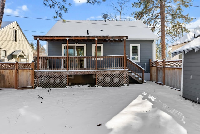 snow covered property featuring a porch