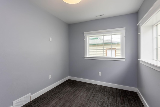 view of carpeted spare room