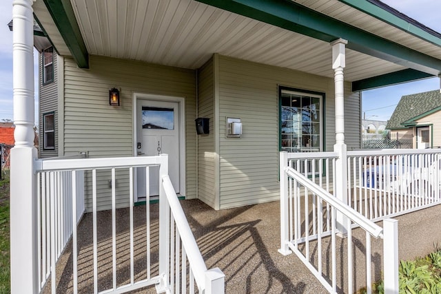 entrance to property with covered porch