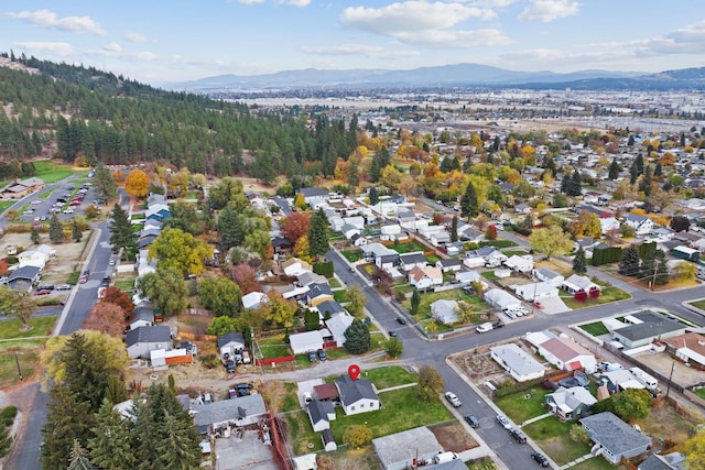 birds eye view of property featuring a mountain view