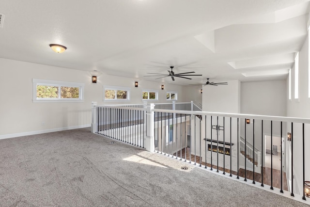 28411 N Milan Rd, Chattaroy, WA 99003 - corridor featuring a healthy amount of sunlight and carpet flooring