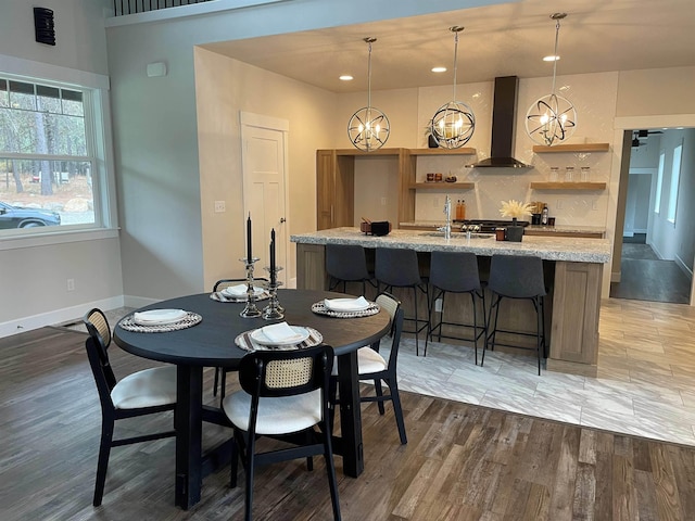 28411 N Milan Rd, Chattaroy, WA 99003 - dining room featuring sink and hardwood / wood-style floors