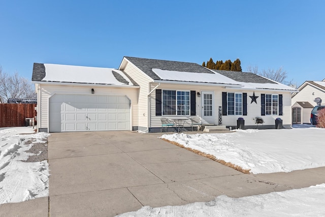 ranch-style home with a garage