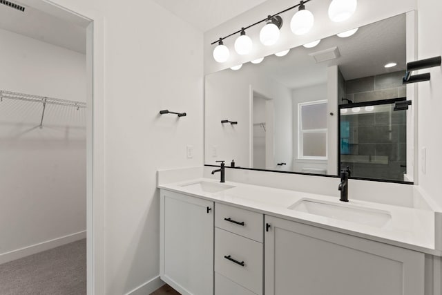 bathroom featuring vanity and walk in shower