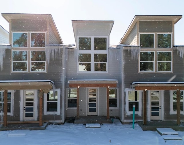 view of snow covered property