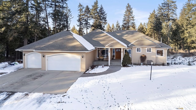 ranch-style house featuring a garage