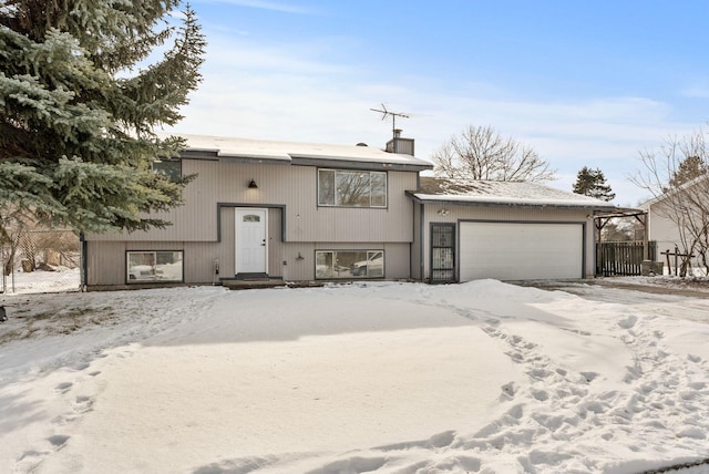 raised ranch with a garage