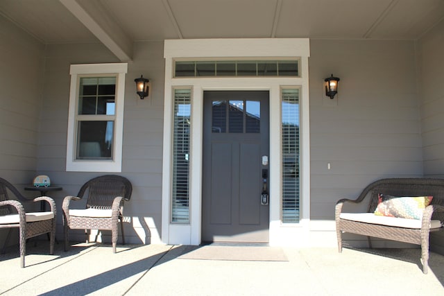 doorway to property with a porch