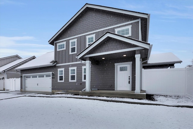 view of front of home with a garage