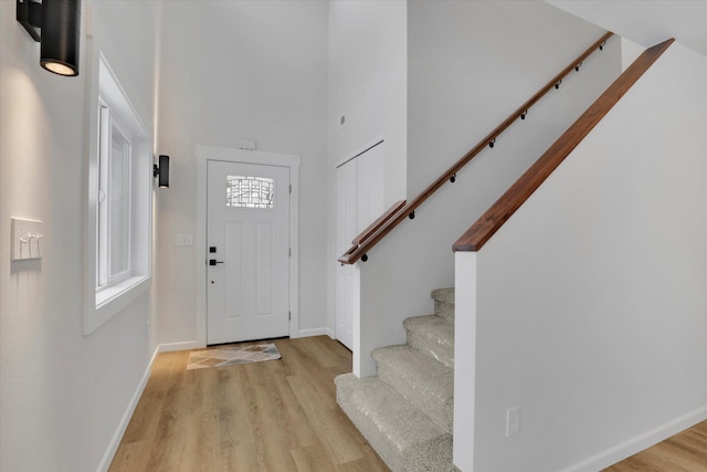 foyer with light hardwood / wood-style flooring