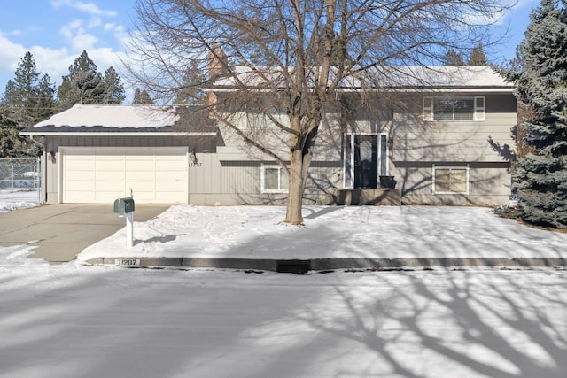 raised ranch featuring a garage