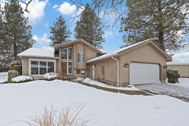 tri-level home featuring a garage